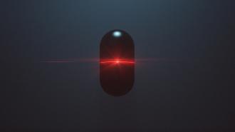 A single black pill with a glowing red horizontal light across its center, set against a dark background, evokes an AI-panic atmosphere.