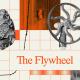 Collage with stone tools, a flywheel, a vintage train, and a graph on a grid background; text reads “The Flywheel” with the number 6 in the top right corner.