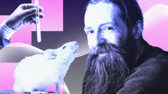 A man with a long beard sits next to a white lab mouse while a gloved hand holds a test tube in the background with abstract purple and pink shapes.
